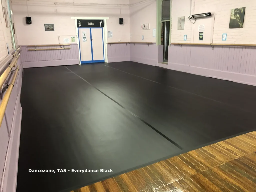 Black EveryDance loose-lay vinyl in a dance studio