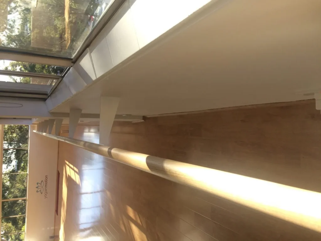 Pilates timber barre on STM brackets recessed through plasterboard